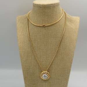 ATTWOOD AND SAWYER necklace , signed on the pendant and chain, amazing condition, rhinestone detailing 30 inch chain, 2.8cm dimaeter pendant