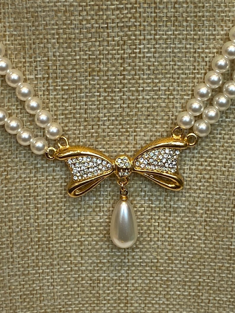 clasp marked silver Repurposed Beautiful piece Lovely faux pearl necklace and diamant\u00e9 bow pendant necklace stunning clasp