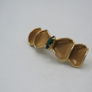 beautiful large vintage gold tone mesh style bow brooch, large statement piece in lovely condition, 7cm in length, green rhinestone