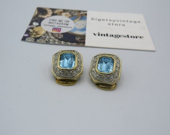 spectacular vintage gold tone clip on statement earrings, high end, stunning design with clear rhinestones and aquamarine glass.........
