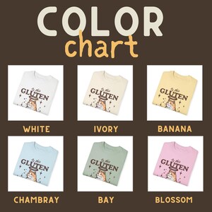 May include: Color chart of t-shirts in various colors, including white, ivory, banana, chambray, bay, and blossom. Each shirt features a graphic with a cat and the text "Is this Gluten Free?"