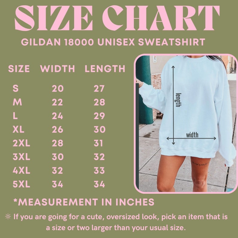May include: Size chart for a Gildan 18000 unisex sweatshirt. The chart shows the width and length measurements in inches for sizes S through 5XL. The chart is on a green background with pink text. A white sweatshirt is shown on the right side of the chart.