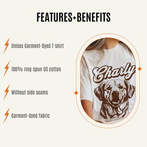 May include: A white t-shirt with a brown graphic of a dog and the text "Charly" in a retro font. The shirt is made of 100% ring-spun US cotton and is garment-dyed.