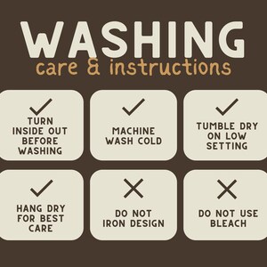May include: A white and brown graphic with instructions for washing a garment. The instructions include turning the garment inside out before washing, machine washing cold, tumble drying on low, hanging dry for best care, not ironing the design, and not using bleach.