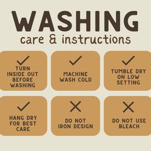 May include: Washing care instructions for a garment.  Turn inside out before washing, machine wash cold, tumble dry on low setting, hang dry for best care, do not iron design, do not use bleach.
