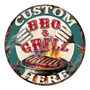 May include: A round, rusty metal sign with a green background and the text "CUSTOM BBQ & GRILL HERE" in red and white lettering. The sign also features a grill with a steak on it, flames, and a spatula and fork.