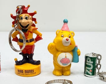 Lot of Vintage Advertising Collectibles Keychains, Pins, Bottle Cap, Care Bear