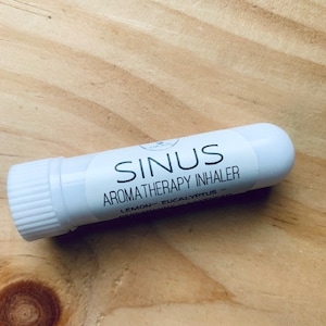 May include: White aromatherapy inhaler tube with the text "SINUS AROMATHERAPY INHALER LEMON - EUCALYPTUS" printed on the label.