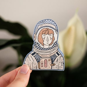 Adesivo de vinil à prova d'água astronauta feminino