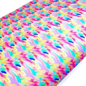 May include: A colorful fabric with a repeating pattern of blue, pink, yellow, and green swirls. The fabric has a slightly textured surface.