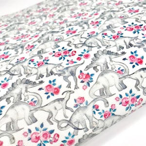 Dinosaurs with pink flowers printed faux leather sheet, Jurassic vinyl fabric, for diy hair bows keychain fob earrings crafting supplies
