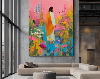 May include: A large, colorful painting depicts a figure in a white robe and orange cloak standing in a field of vibrant flowers. The background is a gradient of pink and yellow, with the flowers in shades of pink, blue, and yellow. The artwork is displayed in a modern living room.