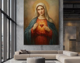 May include: A large vertical canvas print of a religious figure. The figure is depicted with a halo, wearing a blue cloak and red dress, with a heart emitting light. The artwork is displayed in a modern living room setting.