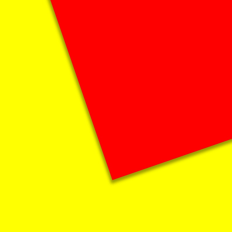 May include: A bright yellow background with a red square angled in the top right corner.