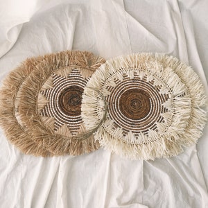 Bohemian Wall Fringe basket made from banana bark in the middle and white seagrass, with raffia fringe. Available in 2 color raffia fringe, natural and bleach raffia. Comes with 50cm or 19.7 inch including Fringe.