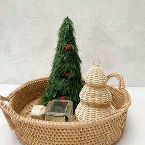 Decoration made from natural rattan with Christmas tree design. Suitable for toys or decoration with 11cm or 4.3 inch diameter and 18cm or 7 inch height.