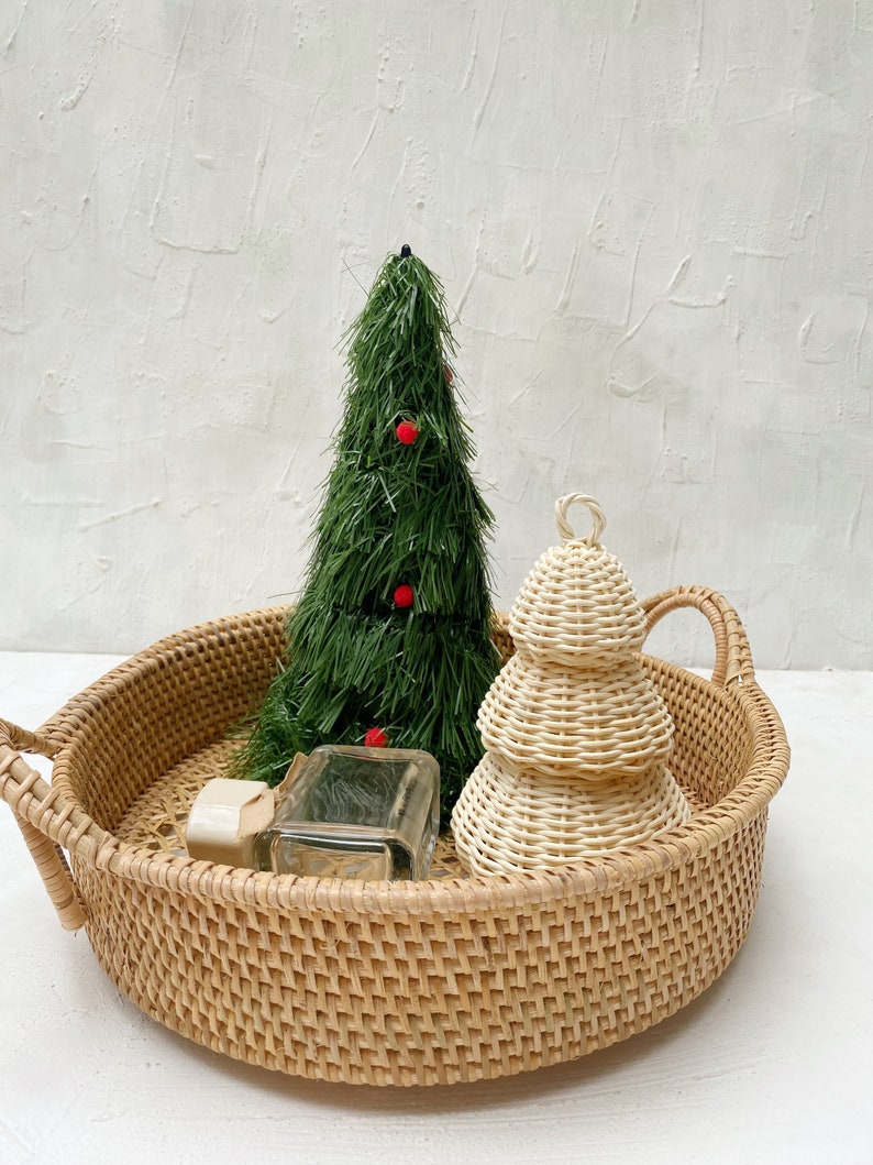 Decoration made from natural rattan with Christmas tree design. Suitable for toys or decoration with 11cm or 4.3 inch diameter and 18cm or 7 inch height.