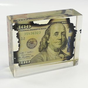New 100 dollar bill.  Burnt  dollar bill. Realistic dollar bill for stories. Burnt dollar bill. Burn dollar bill
