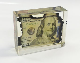 New 100 dollar bill.  Burnt  dollar bill. Realistic dollar bill for stories. Burnt dollar bill. Burn dollar bill