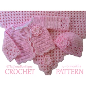 Könnte beinhalten: Rosa gehäkeltes Baby-Set mit Decke, Mütze und Cardigan mit Blumenschmuck. Das Set ist für ein Baby im Alter von 3-6 Monaten. Das Muster ist zum Kauf erhältlich. ©TatjanaBoutique CROCHET PATTERN