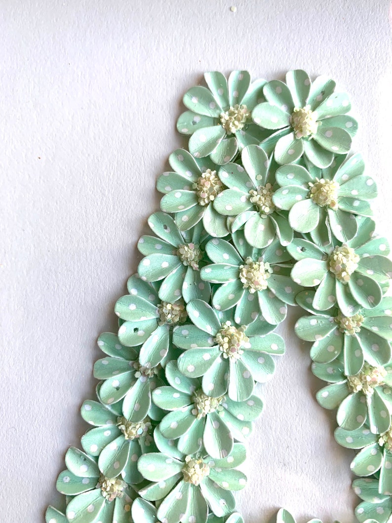 varies colour flower art Letter A