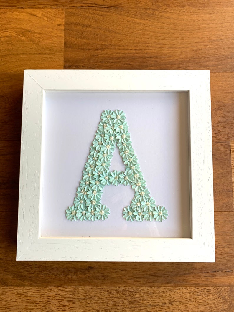 varies colour flower art Letter A