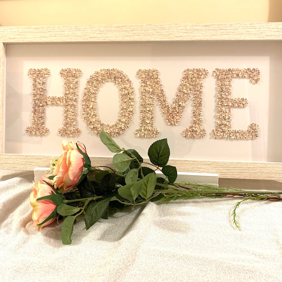 Home picture made with small, delicate, handmade flowers into the word home, then framed into a beautiful shabby chic frame