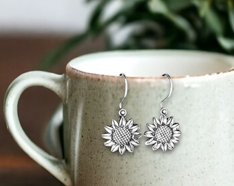 Tiny sunflower, nature-inspired, fine silver (PMC), hand-crafted earrings by Cindy Bina
