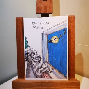 Cocker Spaniel Weihnachtskarte - Weihnachtsmann und seine Schlittenkarte - Weihnachtshund karte.