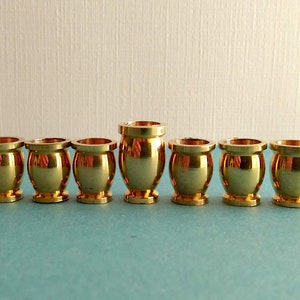 Set of 9 Brass Hanukkah Candle Cups with a Taller Shamash