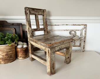 Small rustic chippy wooden children’s stool