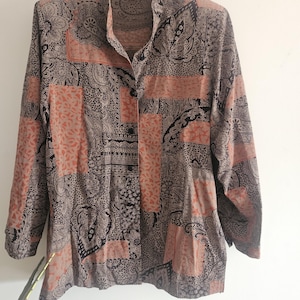 Blusa vintage con estampado floral paisley en color negro, naranja y marrón, talla 10 12 del Reino Unido