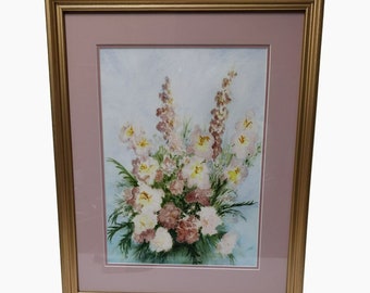 May include: A framed watercolor painting of a bouquet of pink and white flowers in a vase. The flowers are arranged in a loose, natural style, and the background is a soft blue.