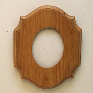 OVAL opening 4" x 5"  natural finished hardwood ash photo frame ready to wall hang.