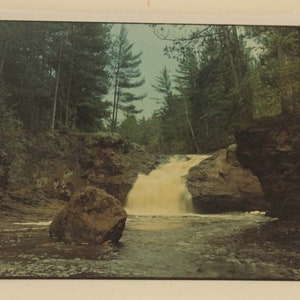 An 11 x 14&quot; Northern Michigan Water Falls photograph Plaque mounted for easy wall hanging decor.