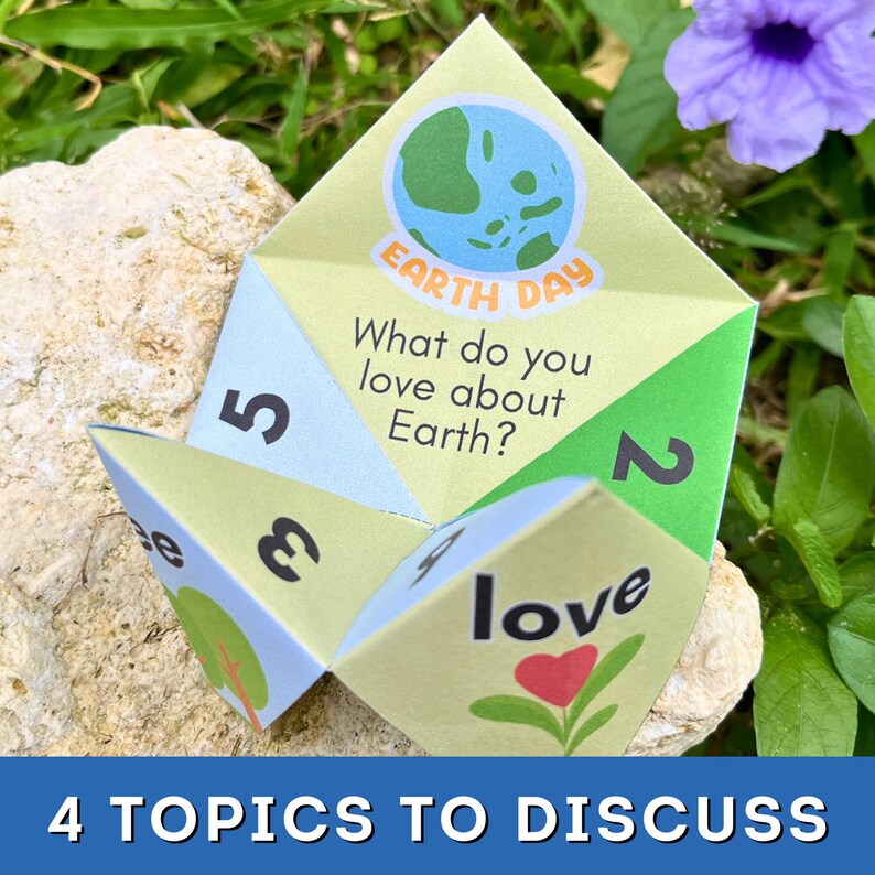 a photo of an open Earth day activity for kids. A fortune teller with the conversation question, What do you love about Earth?