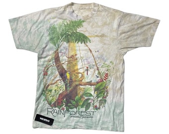 Camiseta vintage de los años 90 con costura simple y diseño de selva tropical en azul líquido