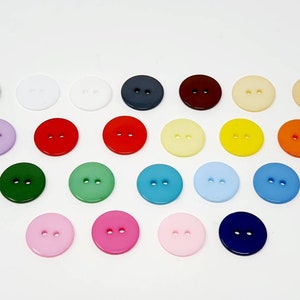 20mm round 2 hole buttons . Smartie type buttons. Great quality many colours