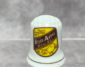 ミネソタ州のお土産、金の縁取りと州地図のデザインが施された磁器の