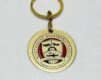 Northwest Aviation College Gold Keychain With Auburn Flight Service Logo
