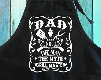 May include: Black apron with a white design that says "DAD, BEST NO. 1, THE MAN THE MYTH, GRILL MASTER".