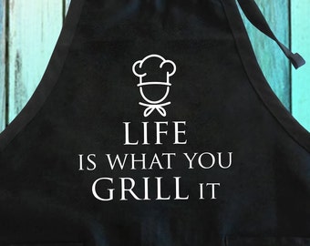 Delantal divertido para barbacoa: La vida es lo que se cocina, mezcla de algodón y poliéster.