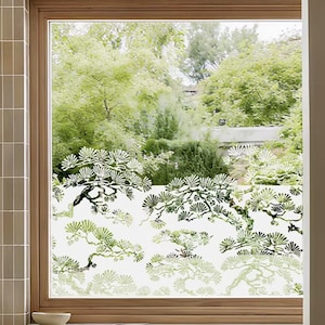 May include: A set of three ceramic mugs with a speckled, matte finish in cream, light grey, and dark grey. Each mug has a simple, minimalist design, ideal for coffee or tea.