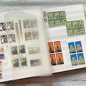 Poststamp album, Vintage blue half full A4 with Stamp Collection Postal Stamp Book dutch poststamps.