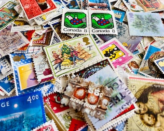 50 Christmas theme poststamps unique stamps xmas holiday season, used from around the world