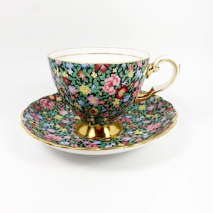 Royal Tuscan England Fine Bone China “Mille Fleurs” Floral Chintz Cup and Saucer Set with Black Background, Gold Trim, Scalloped Edge