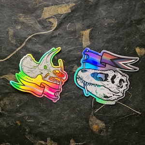Stickers holographiques Fierté - Tyrannosaure et tricératops - Vinyle découpé de haute qualité
