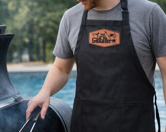 The Grillfather BBQ Apron – Funny Grilling Apron for Dad with Leather Patch – Pitmaster Barbeque Gift