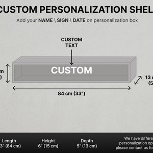 May include: A gray custom personalization shelf with dimensions of 33 inches (84 cm) in length, 6 inches (15 cm) in height, and 5 inches (13 cm) in depth. The shelf has the word "CUSTOM" printed on it. The text "Add your NAME | SIGN | DATE on personalization box" is also visible.