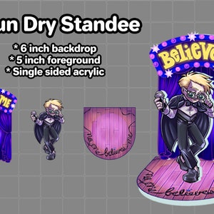 May include: A single-sided acrylic standee featuring a cartoon character with blonde hair and glasses holding a microphone. The character is standing on a stage with a purple curtain and a sign that reads "Believe Me". The standee is 6 inches tall and 5 inches wide.